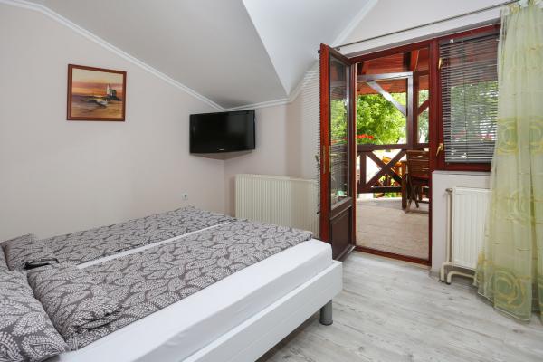 Room with balcony - TV and balcony door